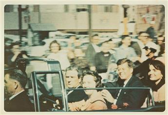 (JFK ASSASSINATION) A set of two color snapshots, one showing President and Mrs. Kennedy with Governor John Connally and his wife Nelli